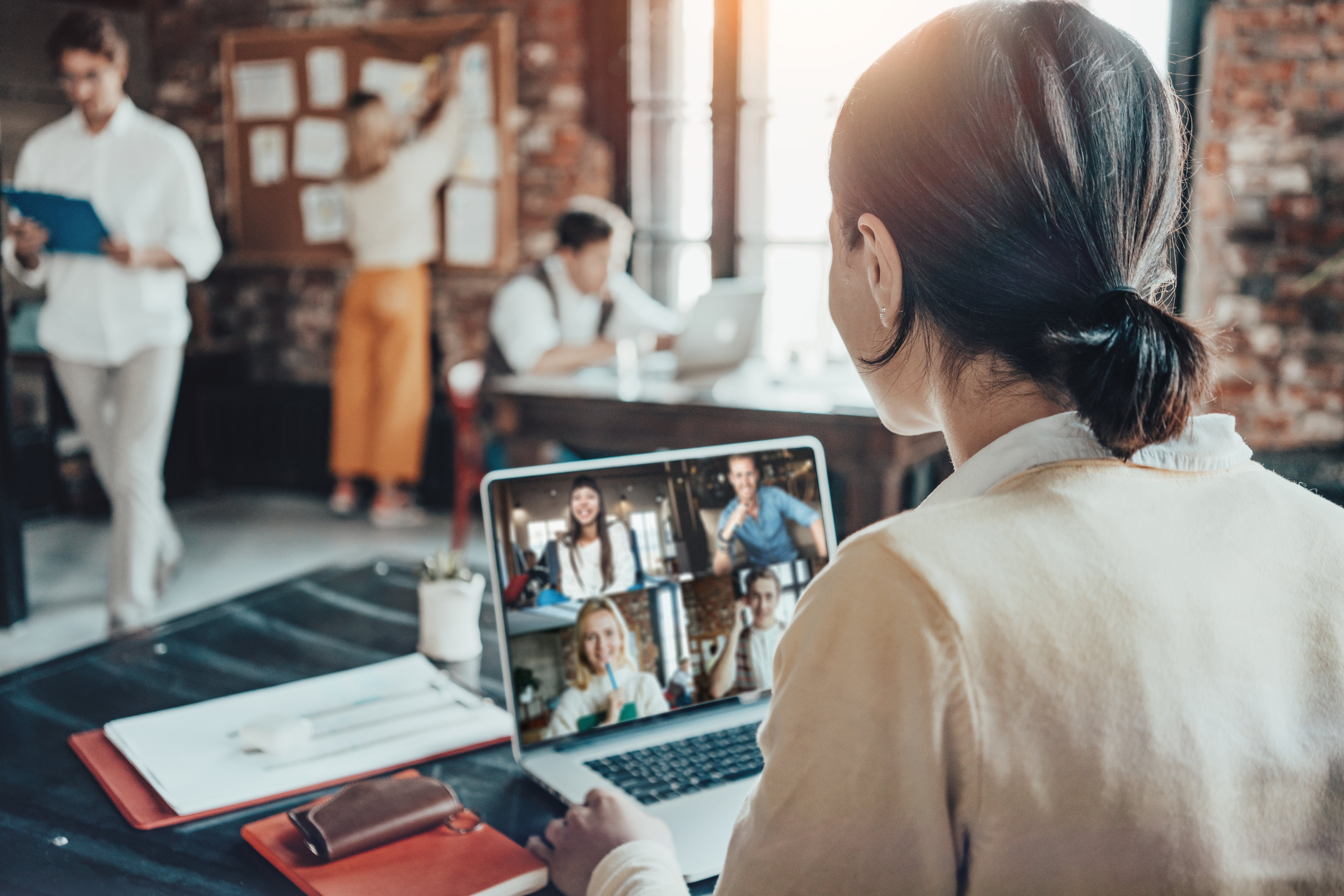 Office business team concept. Video conference call using laptop with remote working teammates